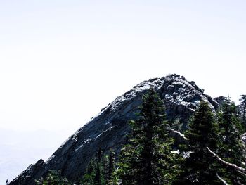 Low angle view of mountain against clear sky