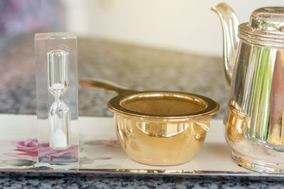 Close-up of glass jar on table