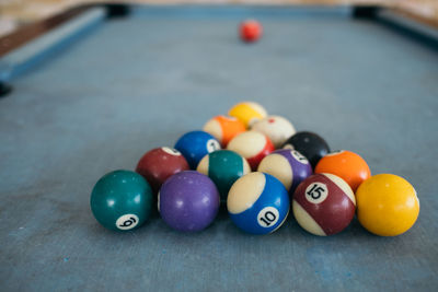 Close-up of multi colored balls on table