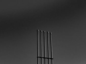 Low angle view of windmill against sky