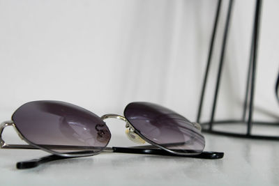Close-up of sunglasses on table
