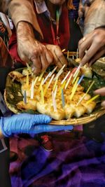 Midsection of man preparing food