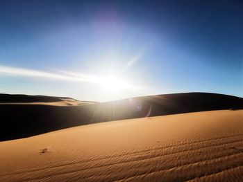 Scenic view of desert against sky