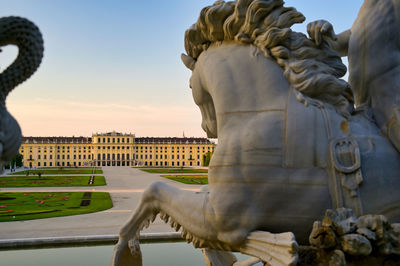 Statue of historic building against sky