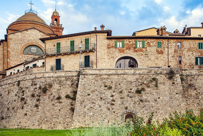 Low angle view of old building against sky