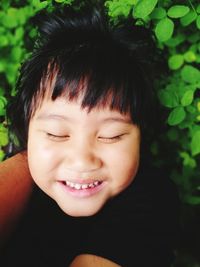 Close-up portrait of smiling boy