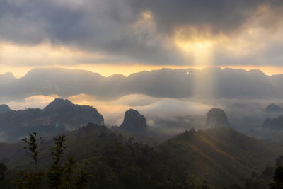 Scenic view of mountains against sky during sunset