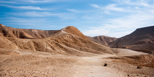 Scenic view of desert against sky