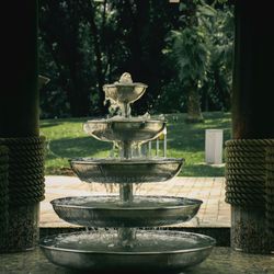 Close-up of fountain against trees