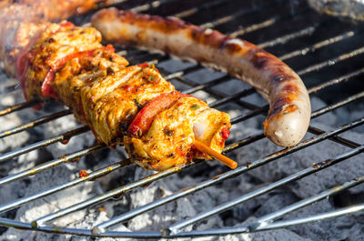 Close-up of meat on barbecue grill