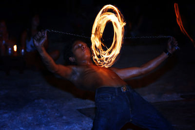 Close-up of man at night