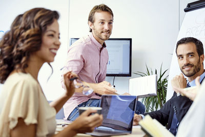 Co workers having a meeting in the office