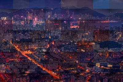 High angle view of illuminated buildings at night