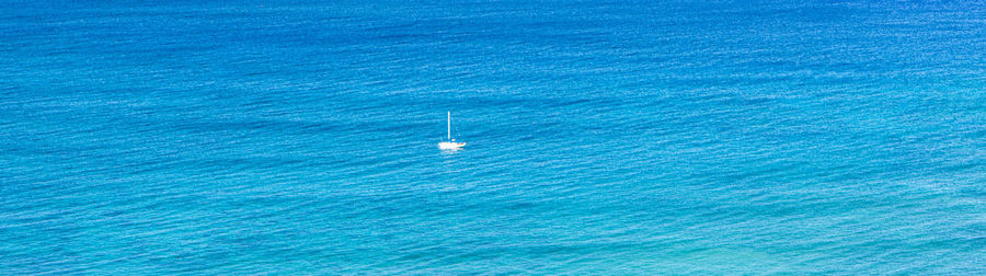 High angle view of sailboat on sea