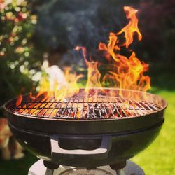 Close-up of fire on barbecue grill