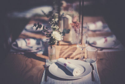 High angle view of people on dining table