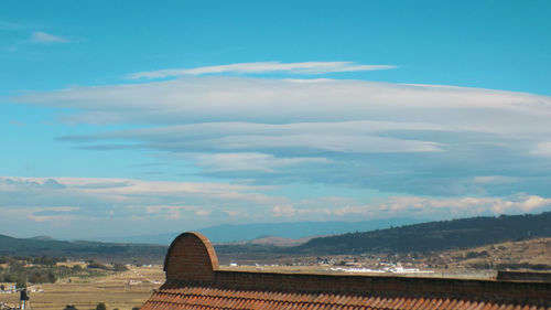 View of tourist resort against cloudy sky