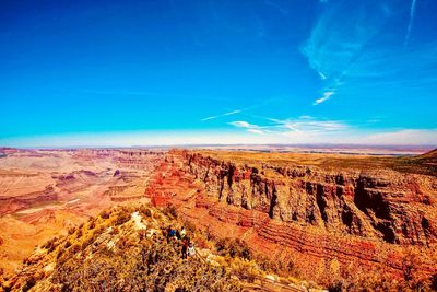 View of landscape against blue sky