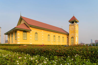 View of red building against sky