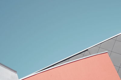 Low angle view of building against blue sky