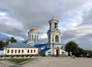 View of building against cloudy sky