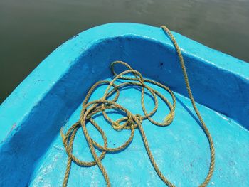 High angle view of rope in boat on lake