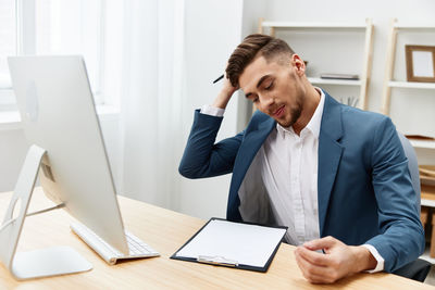 Business colleagues working in office