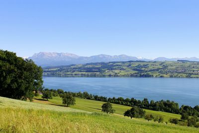 Scenic landscape against clear blue sky