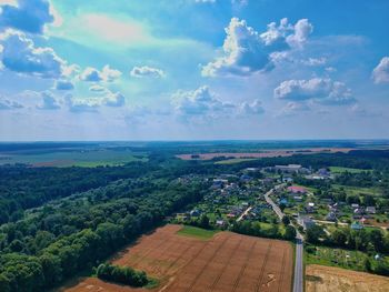 Aerial view of agricultural landscape against sky