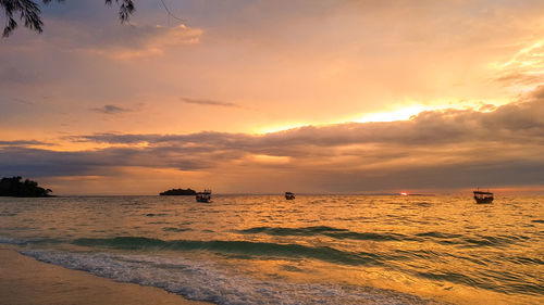 Scenic view of sea against sky during sunset