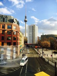 View of communications tower in city