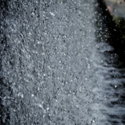 Full frame shot of wet glass