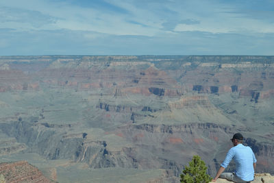 Rear view of man at canyon