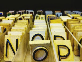 Close-up of alphabets on table