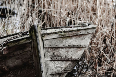 Close-up of old rusty wood on field