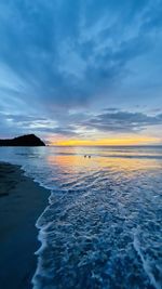 Scenic view of sea against sky at sunset