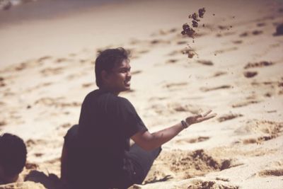 Boy playing on beach