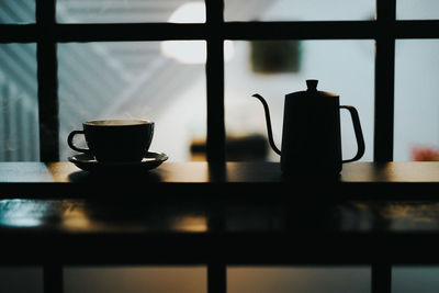 Close-up of coffee cup on table