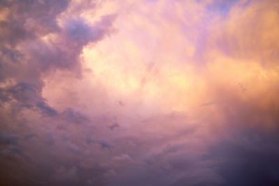 Low angle view of dramatic sky during sunset