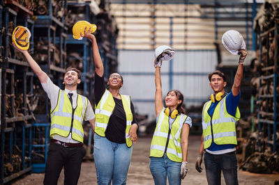 Rear view of people working