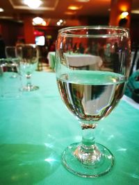 Close-up of wine in glass on table