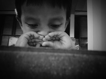 Close-up of cute boy at home