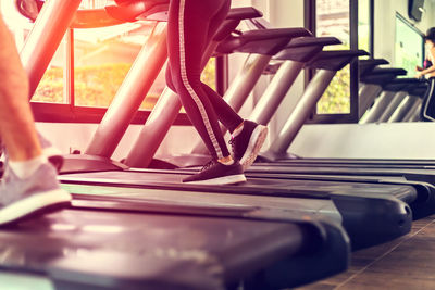 Low section of woman on treadmill