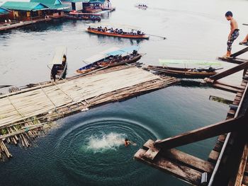 High angle view of people on boat in sea