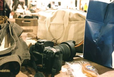 Close-up of camera on table