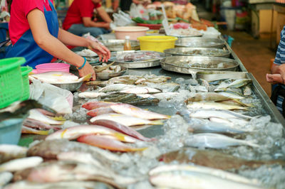 Selective focus on raw fresh fish on the tray for selling in the market 