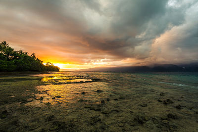 Scenic view of sea against sky during sunset