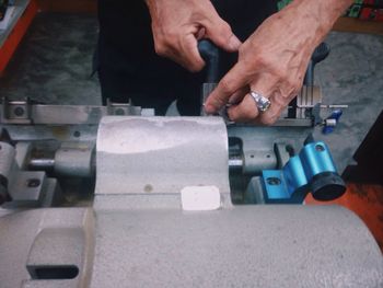 Hand working in workshop