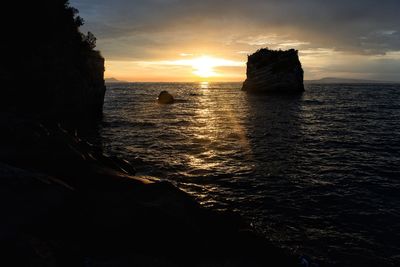 Scenic view of sea against sky during sunset