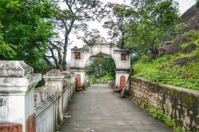 Footpath leading towards historic building